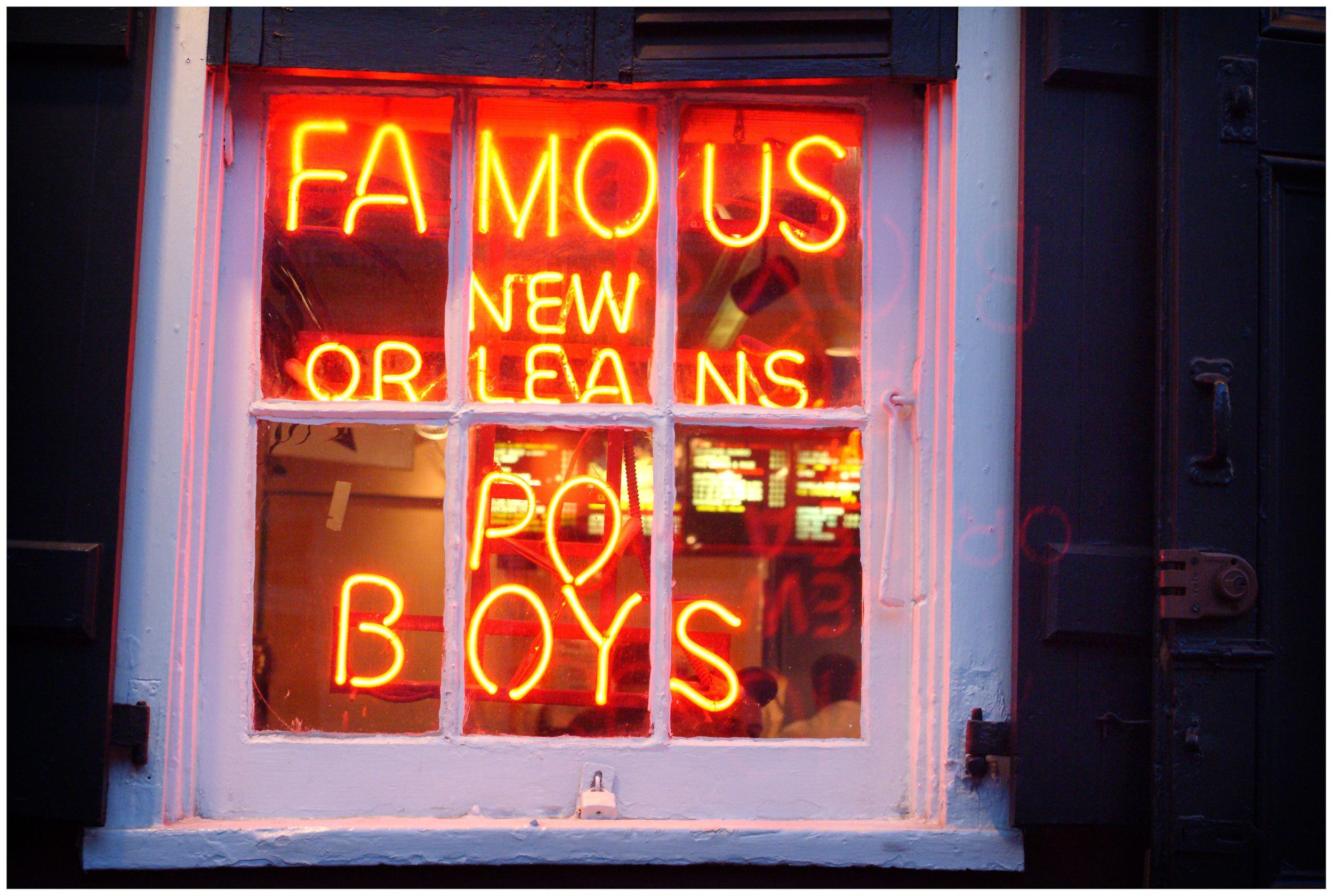 Famous New Orleans Po Boys red neon sign